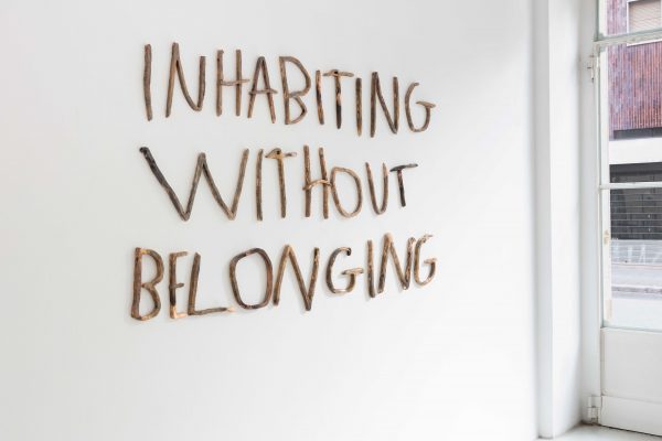 Inhabiting without belonging